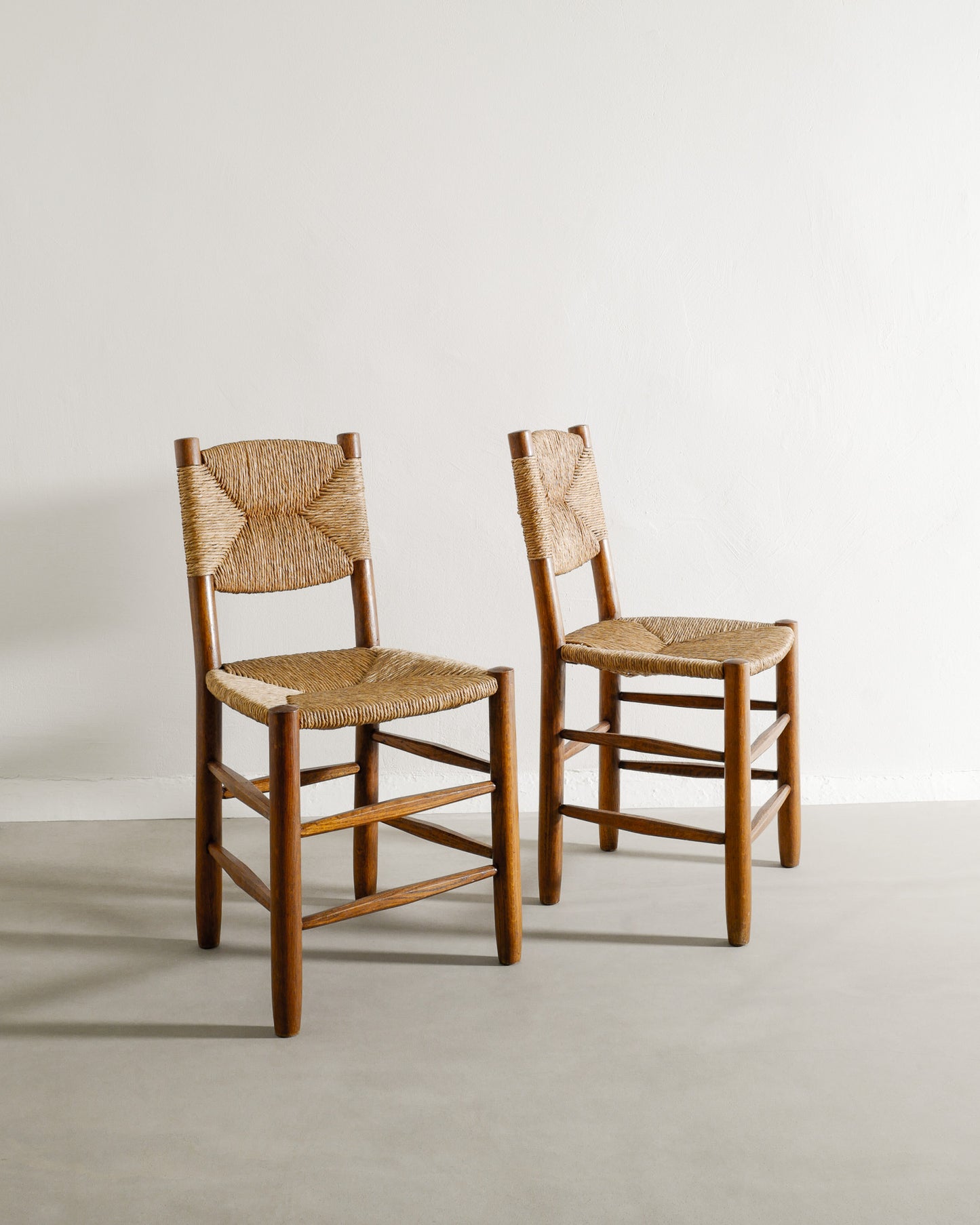 CHARLOTTE PERRIAND "N. 19" CHAIRS, 1950s