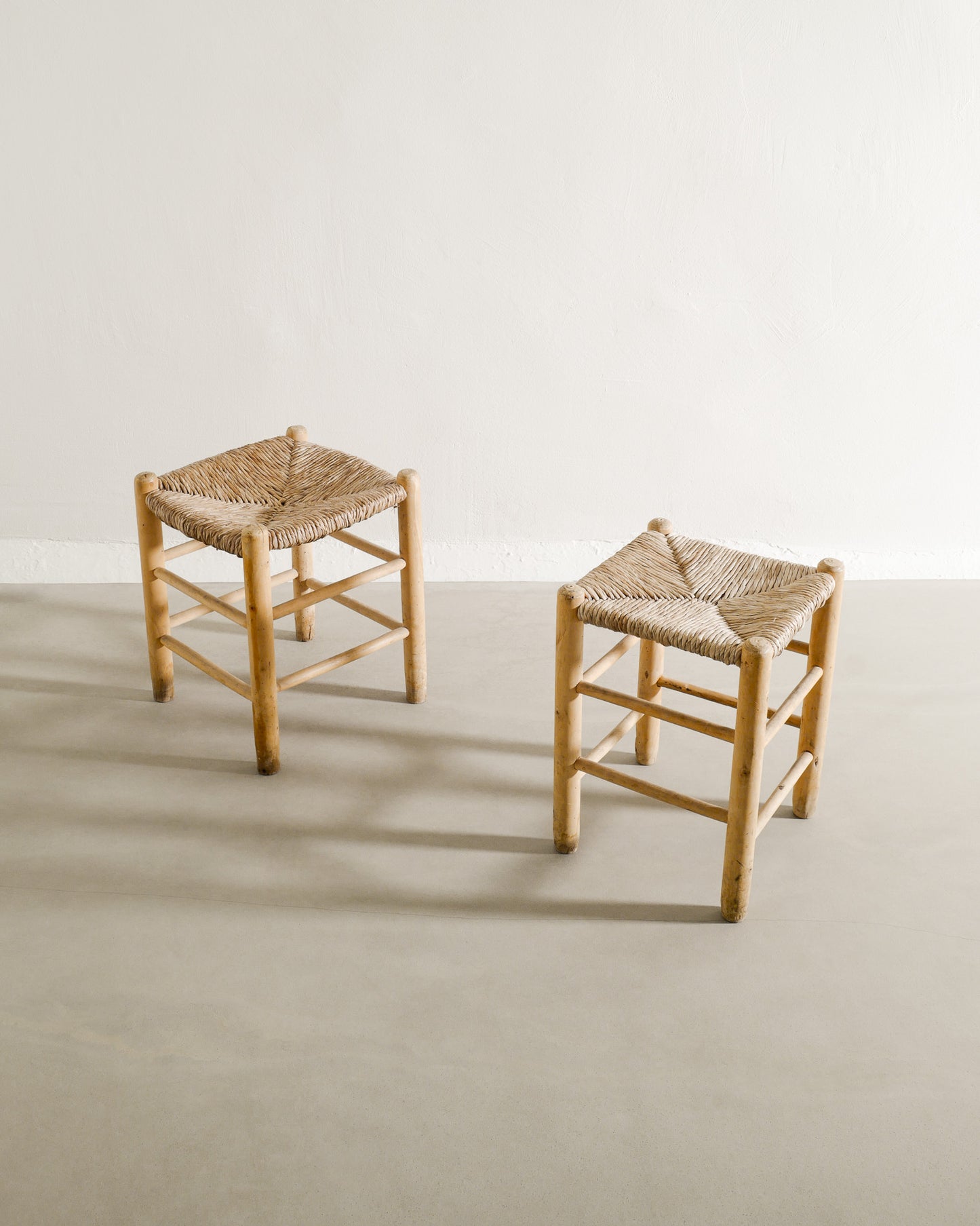 PAIR OF FRENCH STRAW STOOLS, 1960s