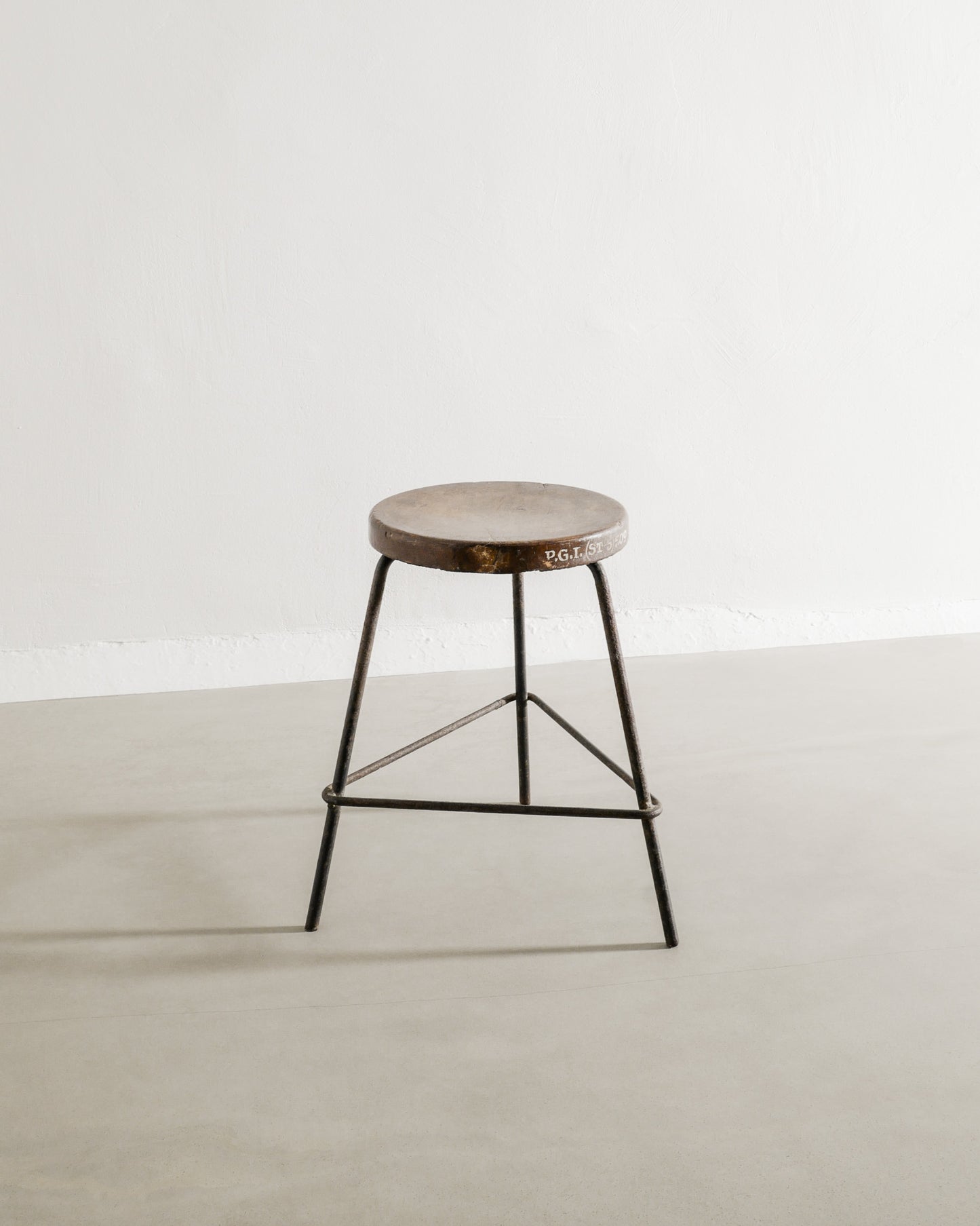 PIERRE JEANNERET TEAK AND IRON STOOL, 1950s