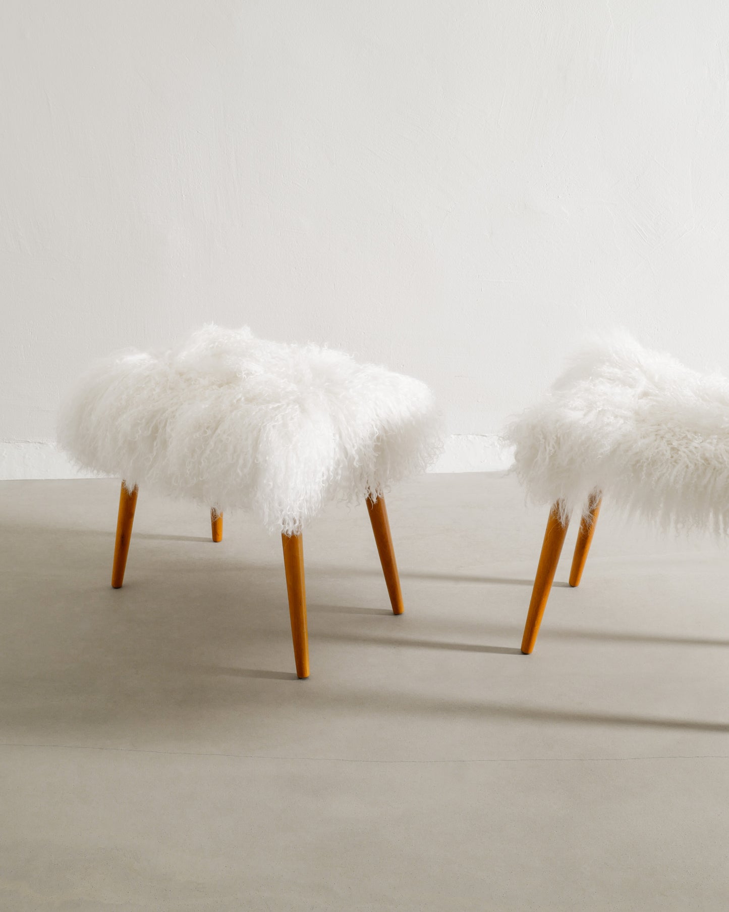 PAIR OF SWEDISH BEECH STOOLS WITH SHEEPSKIN