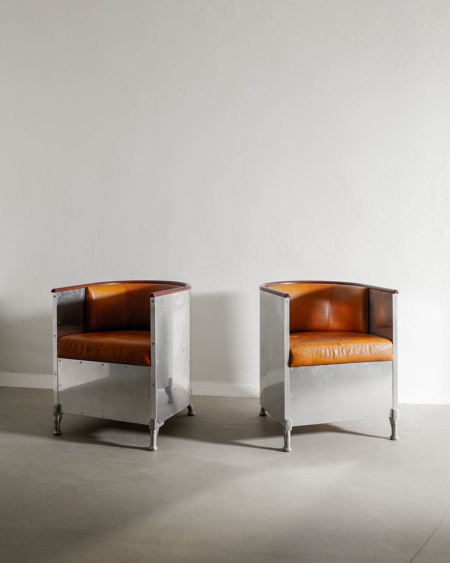 MATS THESELIUS ALUMINUM ARMCHAIRS