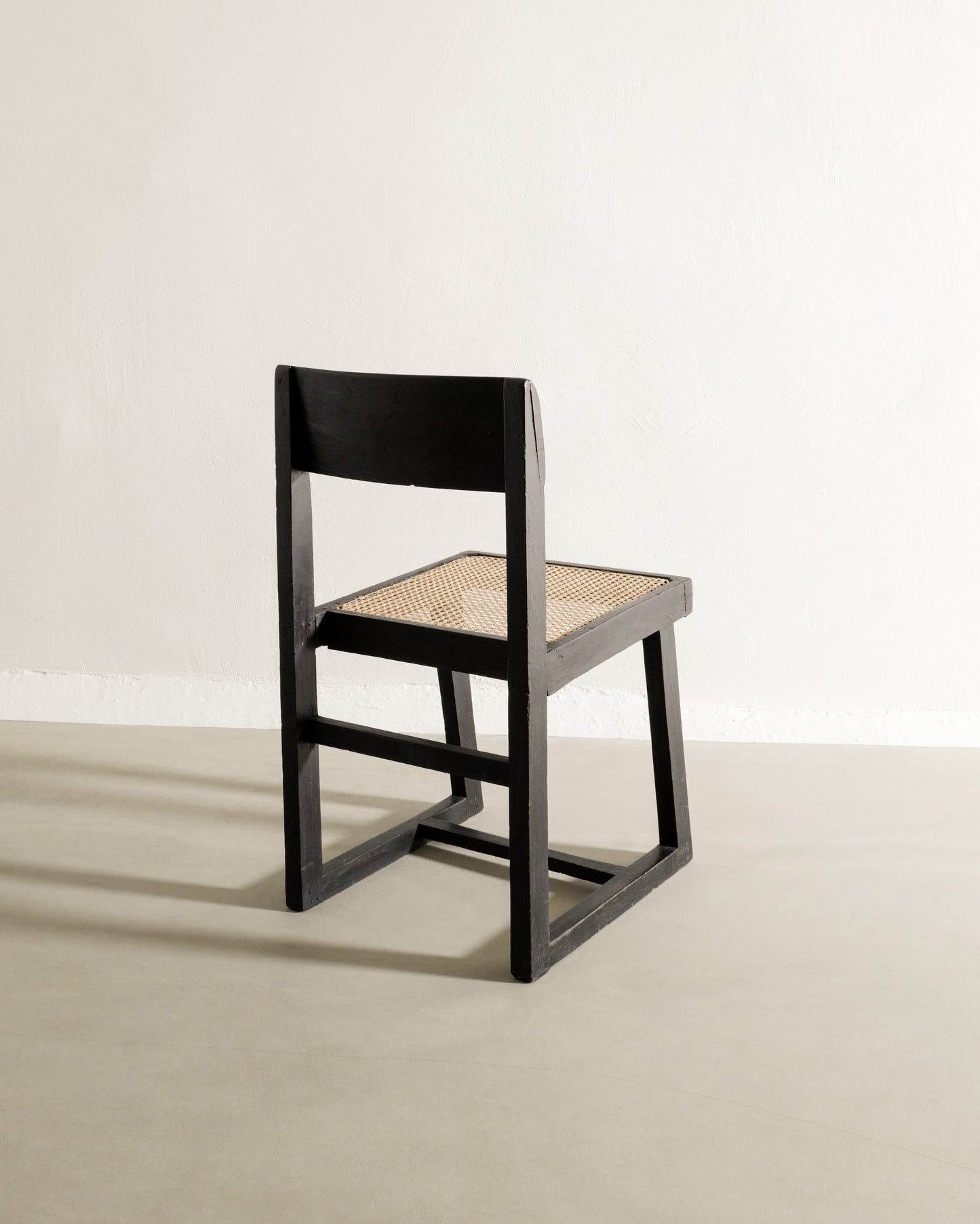 PIERRE JEANNERET BLACK DESK AND CHAIR, 1950s
