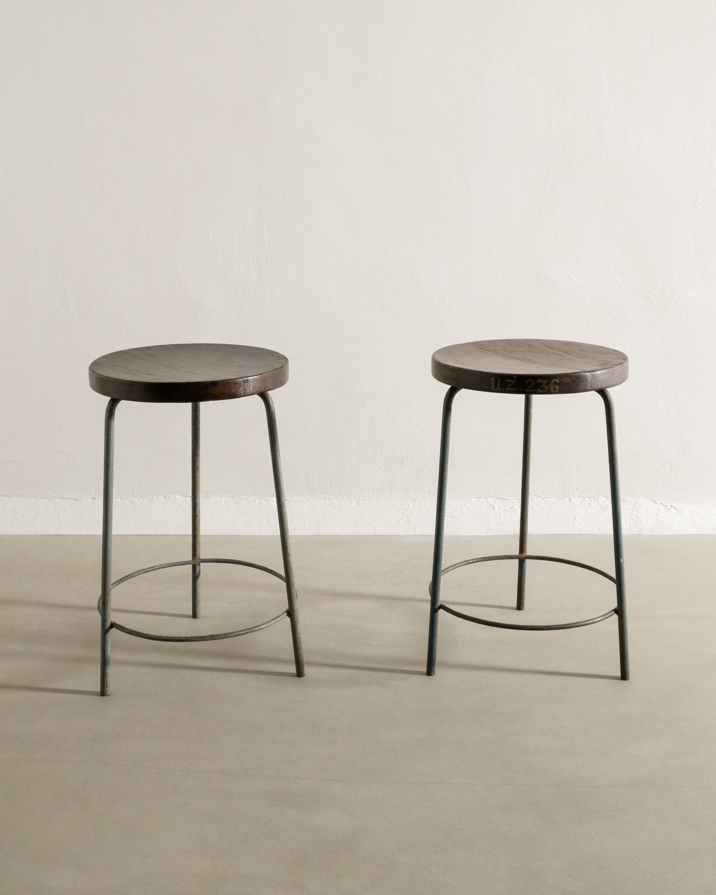 PAIR OF PIERRE JEANNERET HIGH STOOLS, 1950s