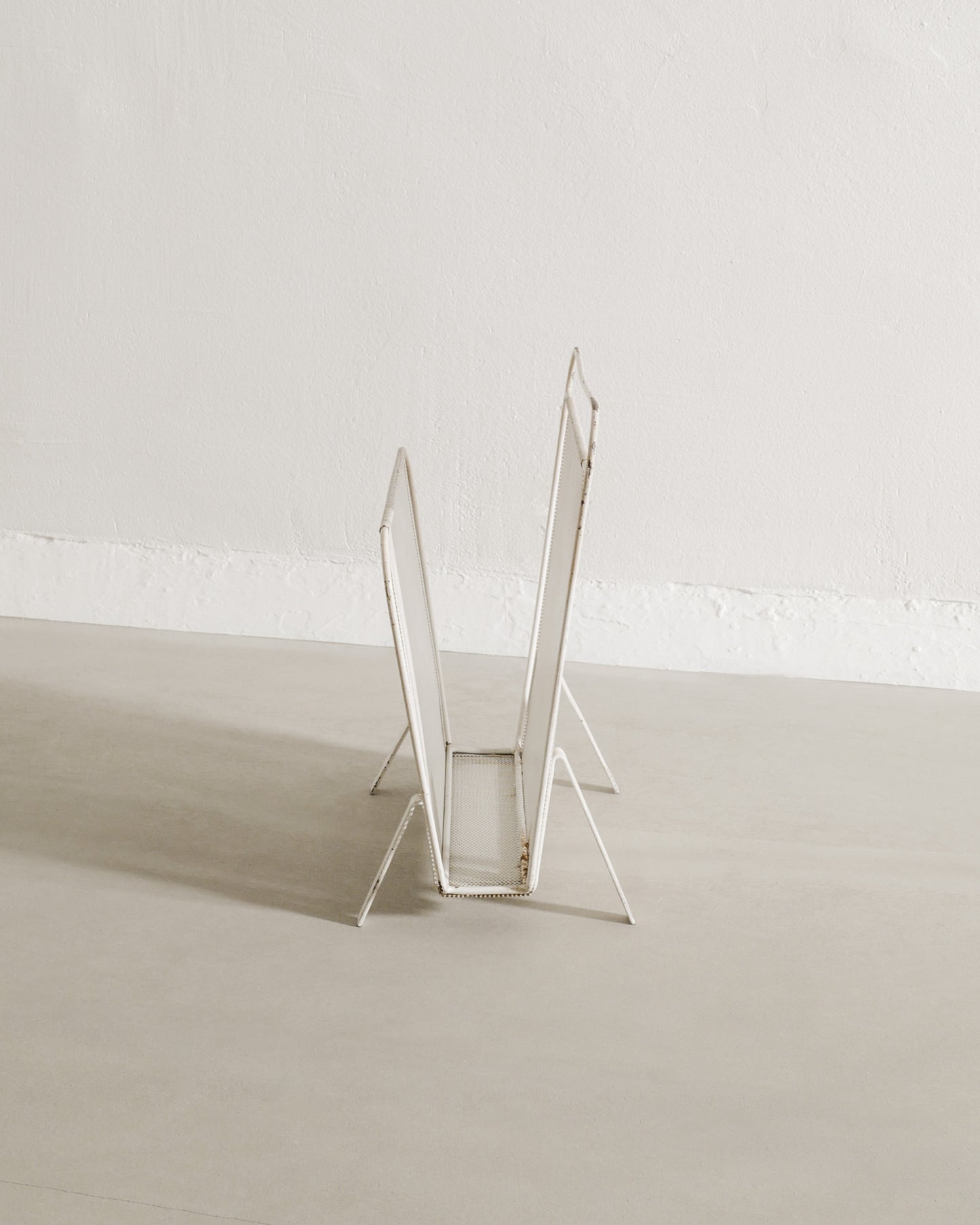 MATHIEU MATÉGOT MAGAZINE RACK, 1950s