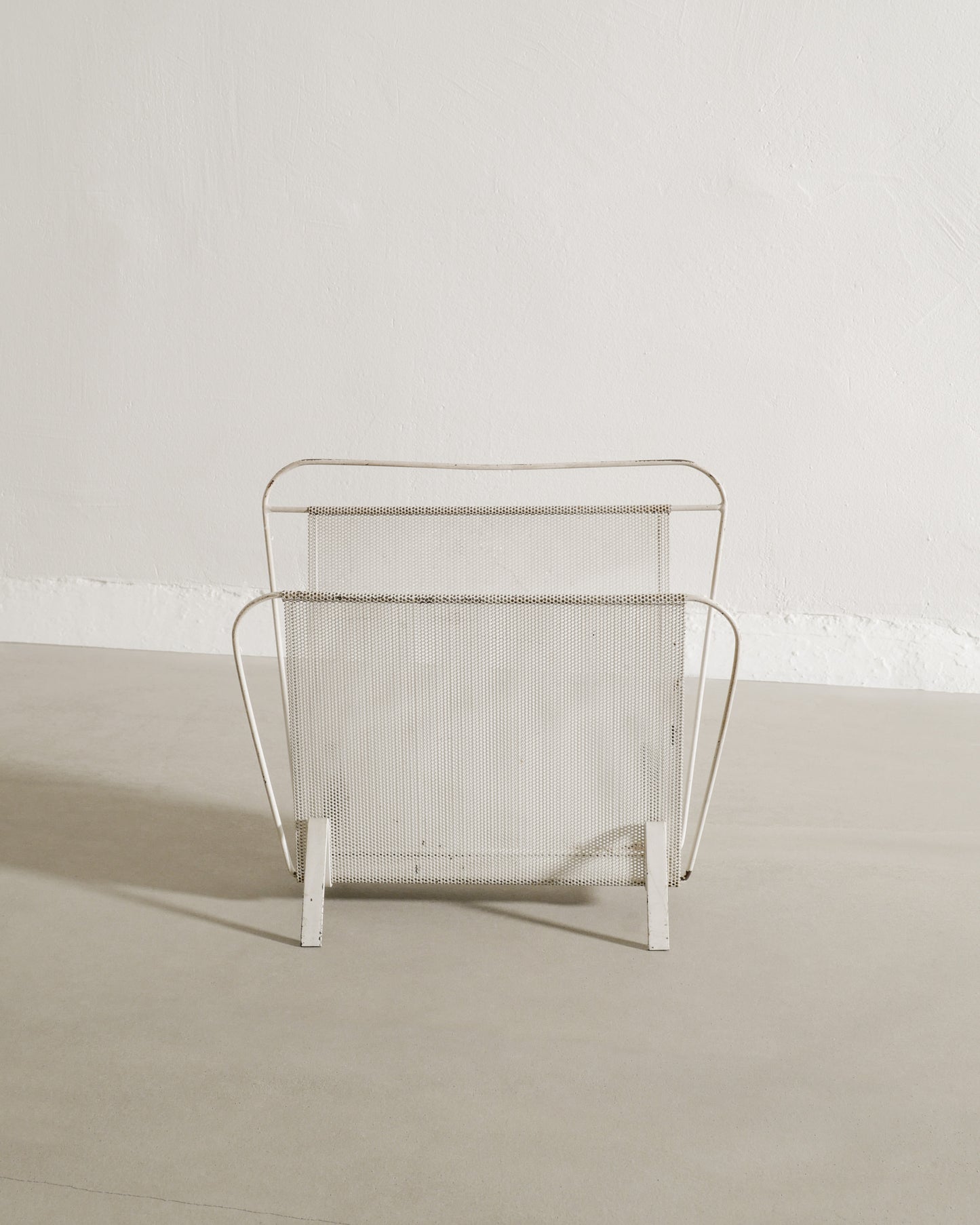 MATHIEU MATÉGOT MAGAZINE RACK, 1950s