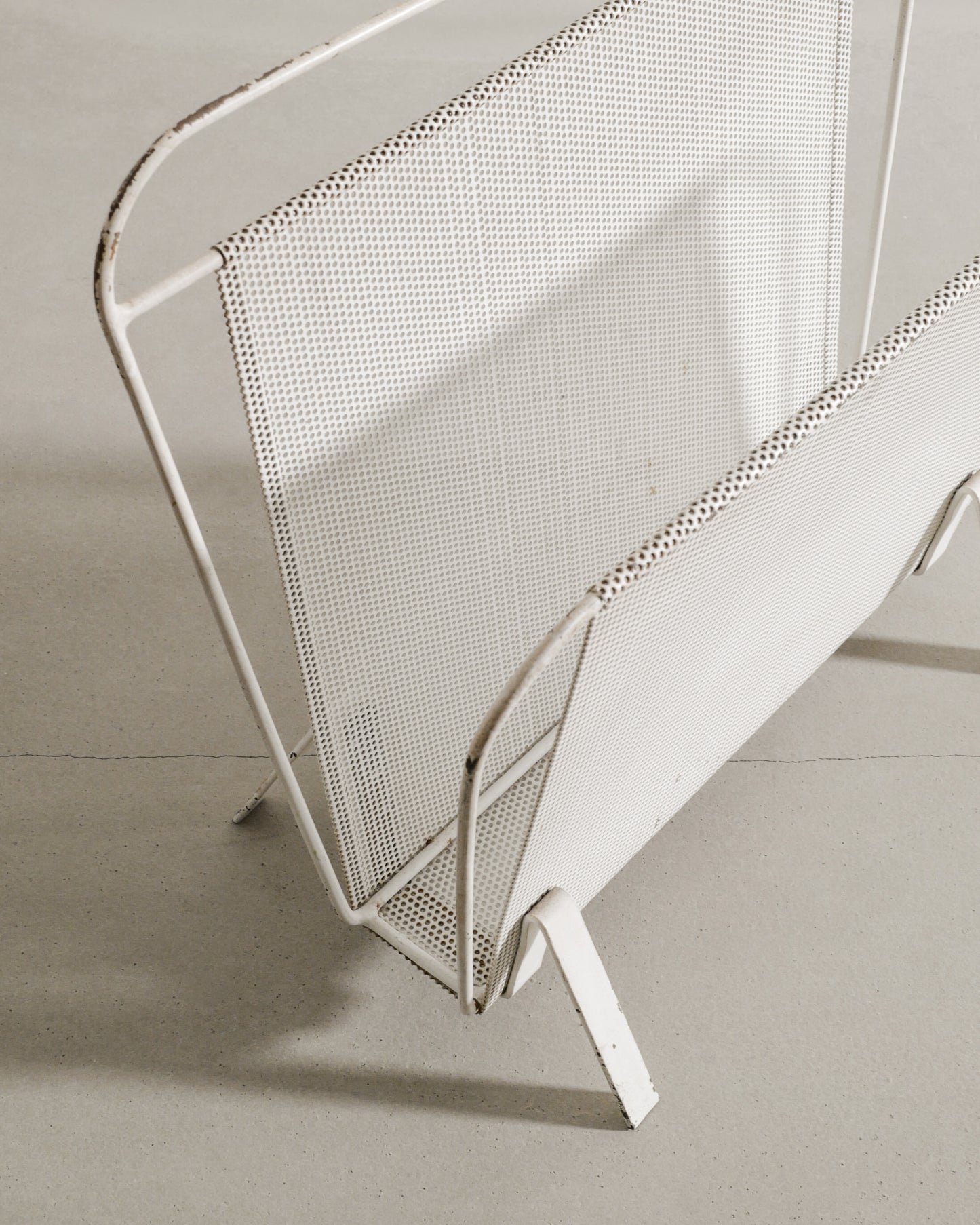 MATHIEU MATÉGOT MAGAZINE RACK, 1950s