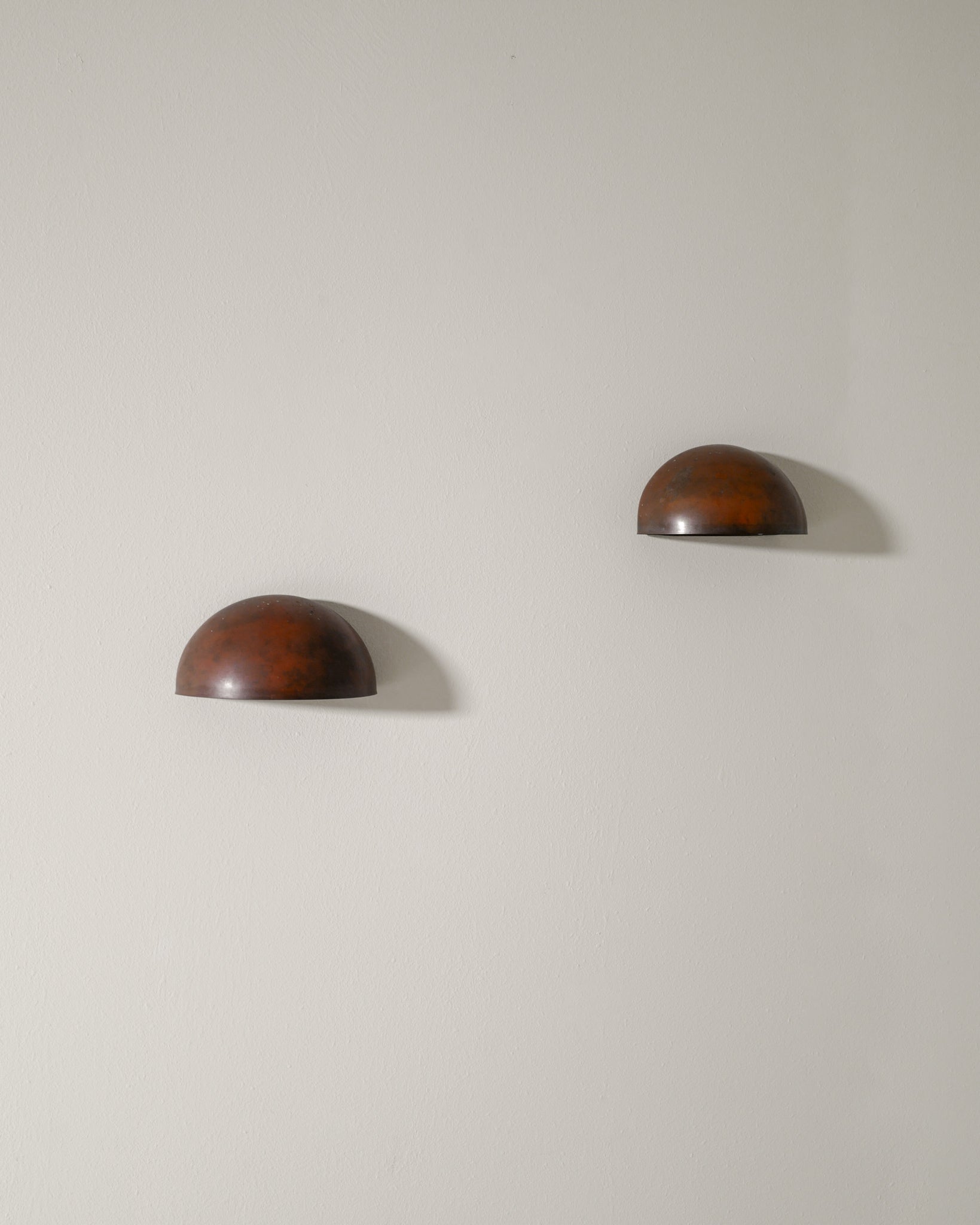 PAIR OF RED COPPER DANISH WALL LAMPS