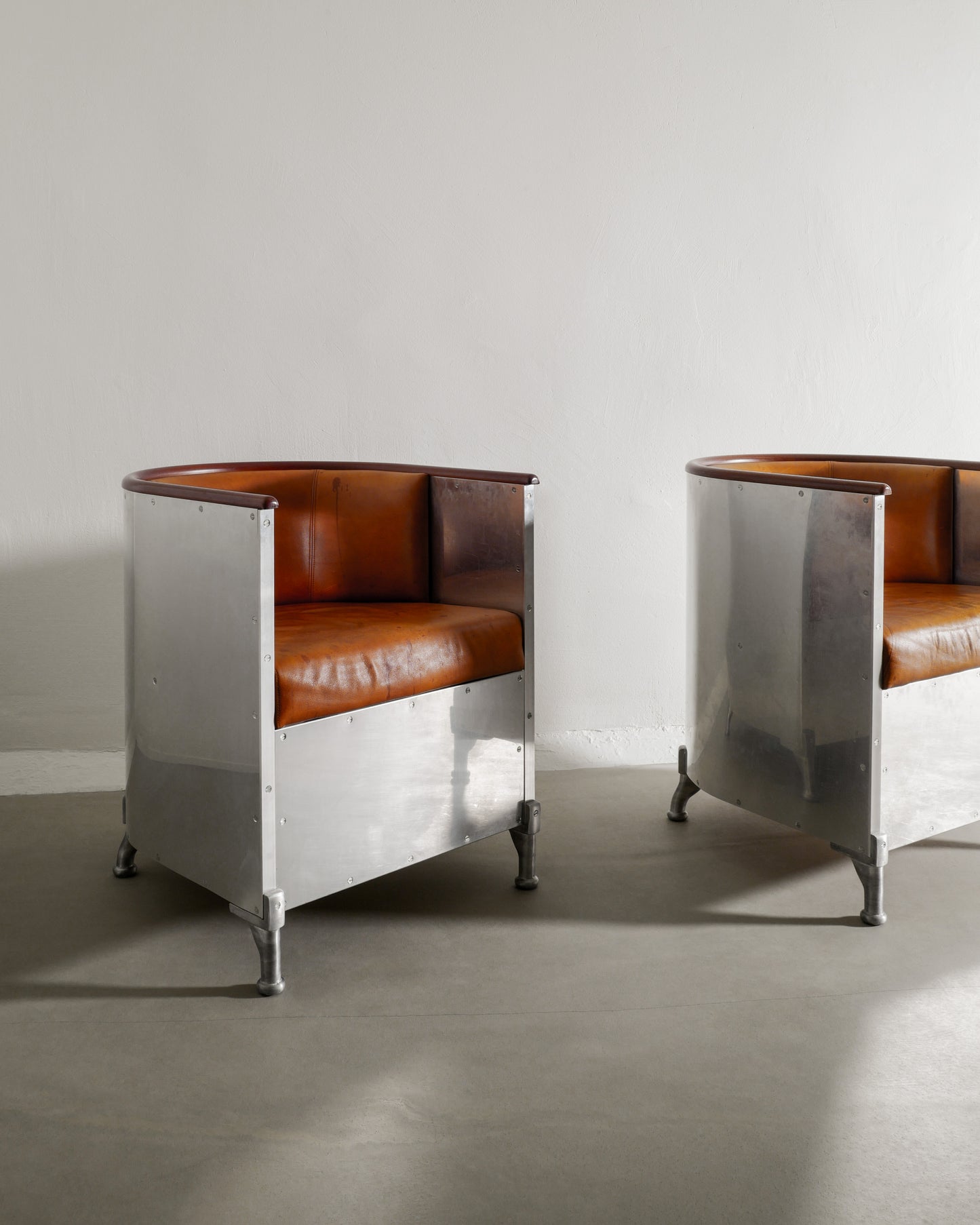 MATS THESELIUS ALUMINUM ARMCHAIRS