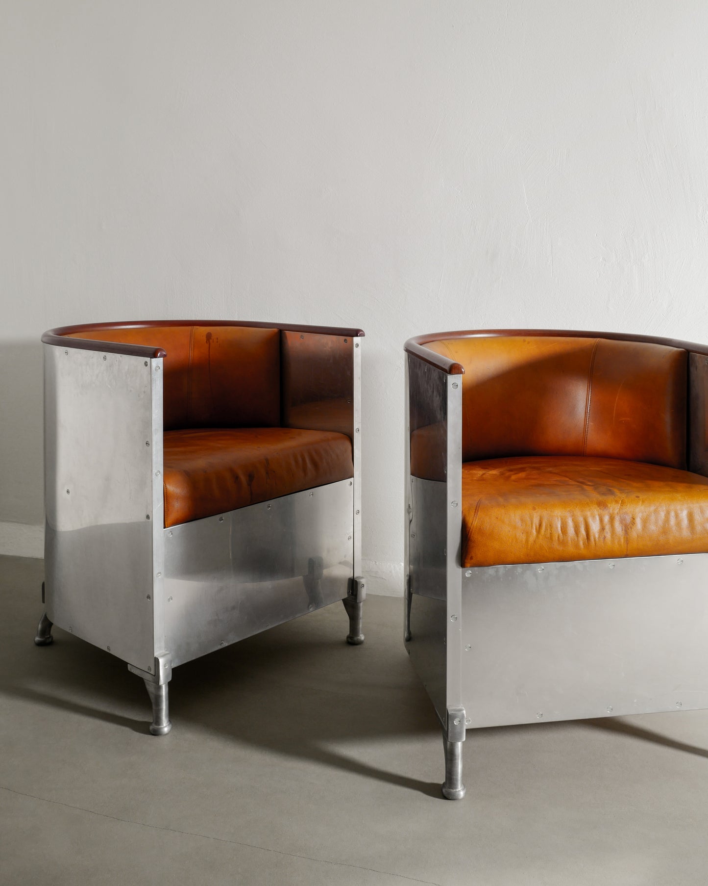 MATS THESELIUS ALUMINUM ARMCHAIRS