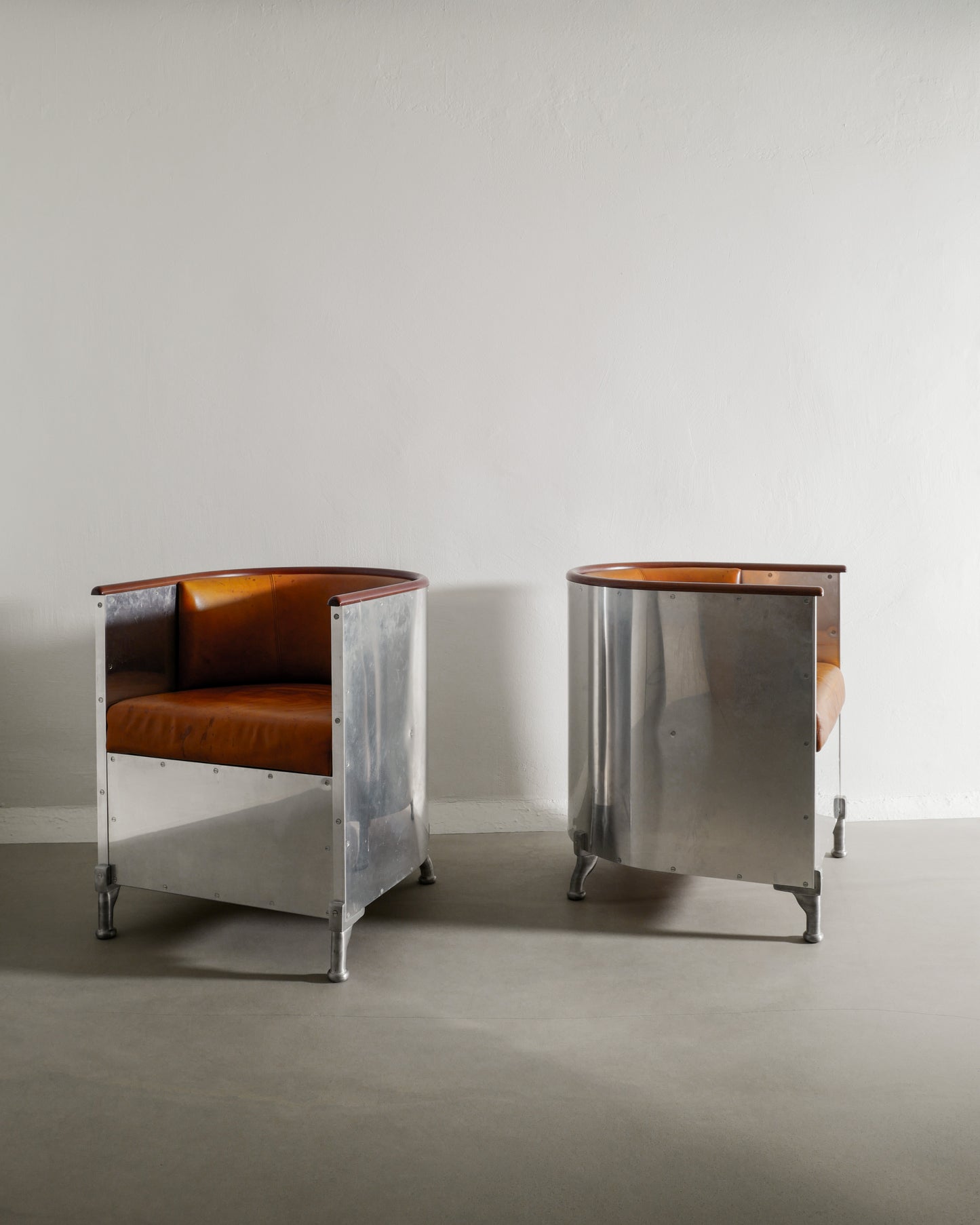 MATS THESELIUS ALUMINUM ARMCHAIRS