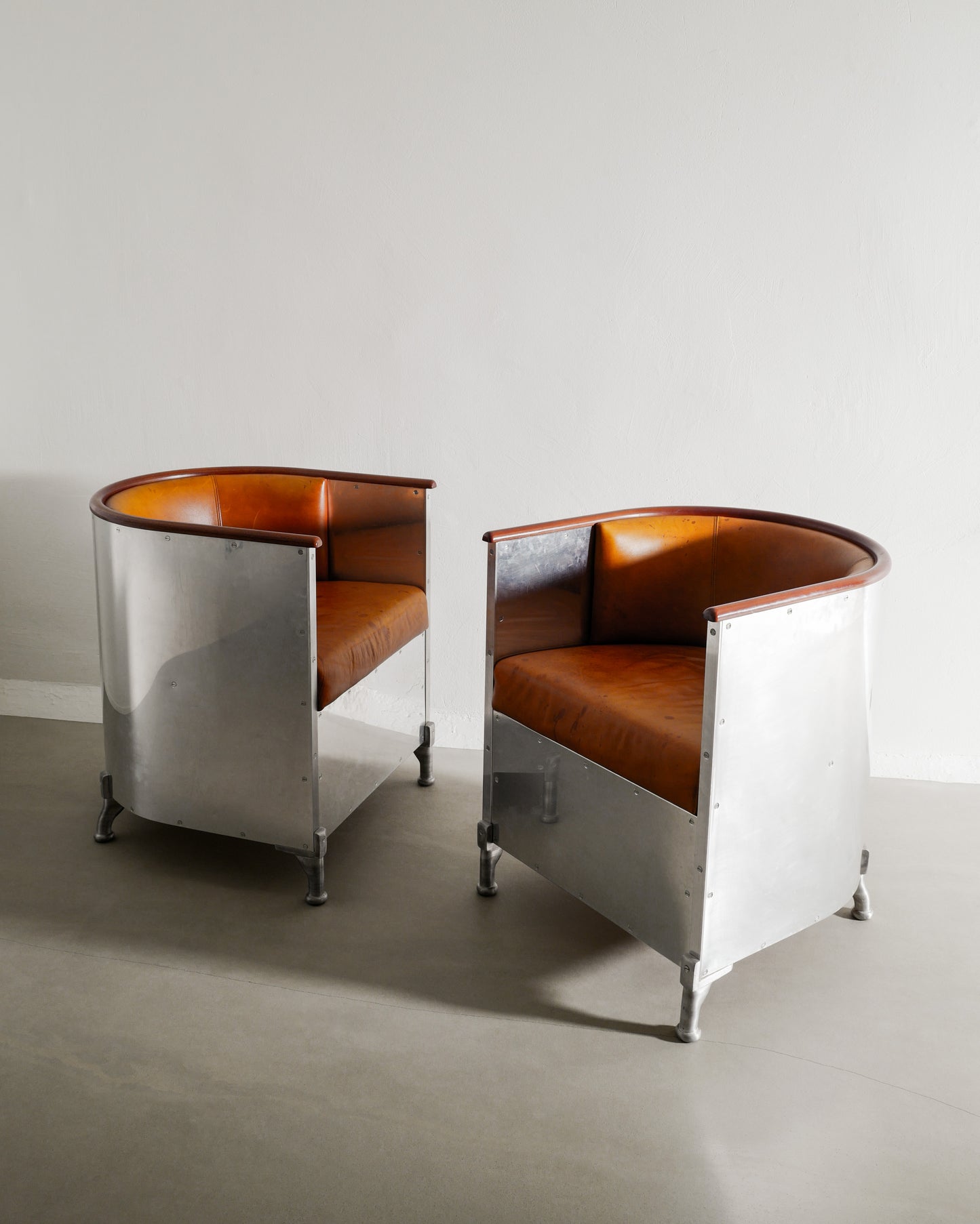 MATS THESELIUS ALUMINUM ARMCHAIRS