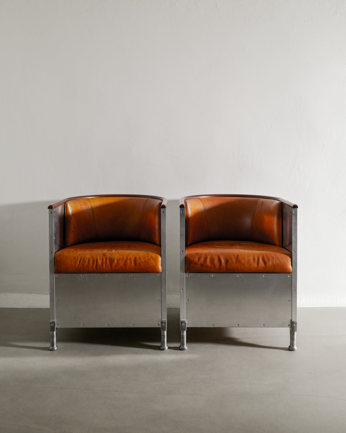 MATS THESELIUS ALUMINUM ARMCHAIRS