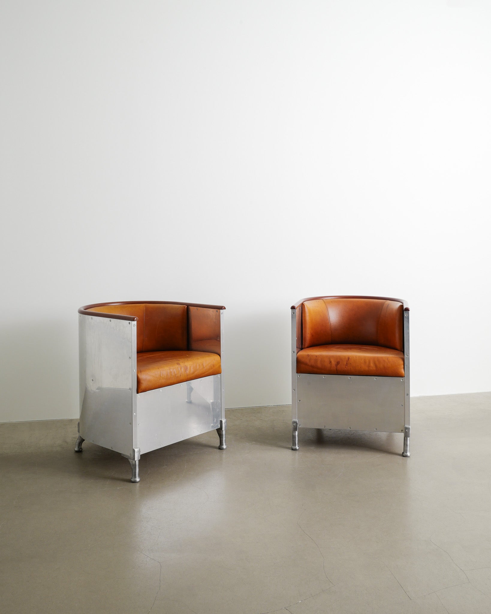 MATS THESELIUS ALUMINUM ARMCHAIRS