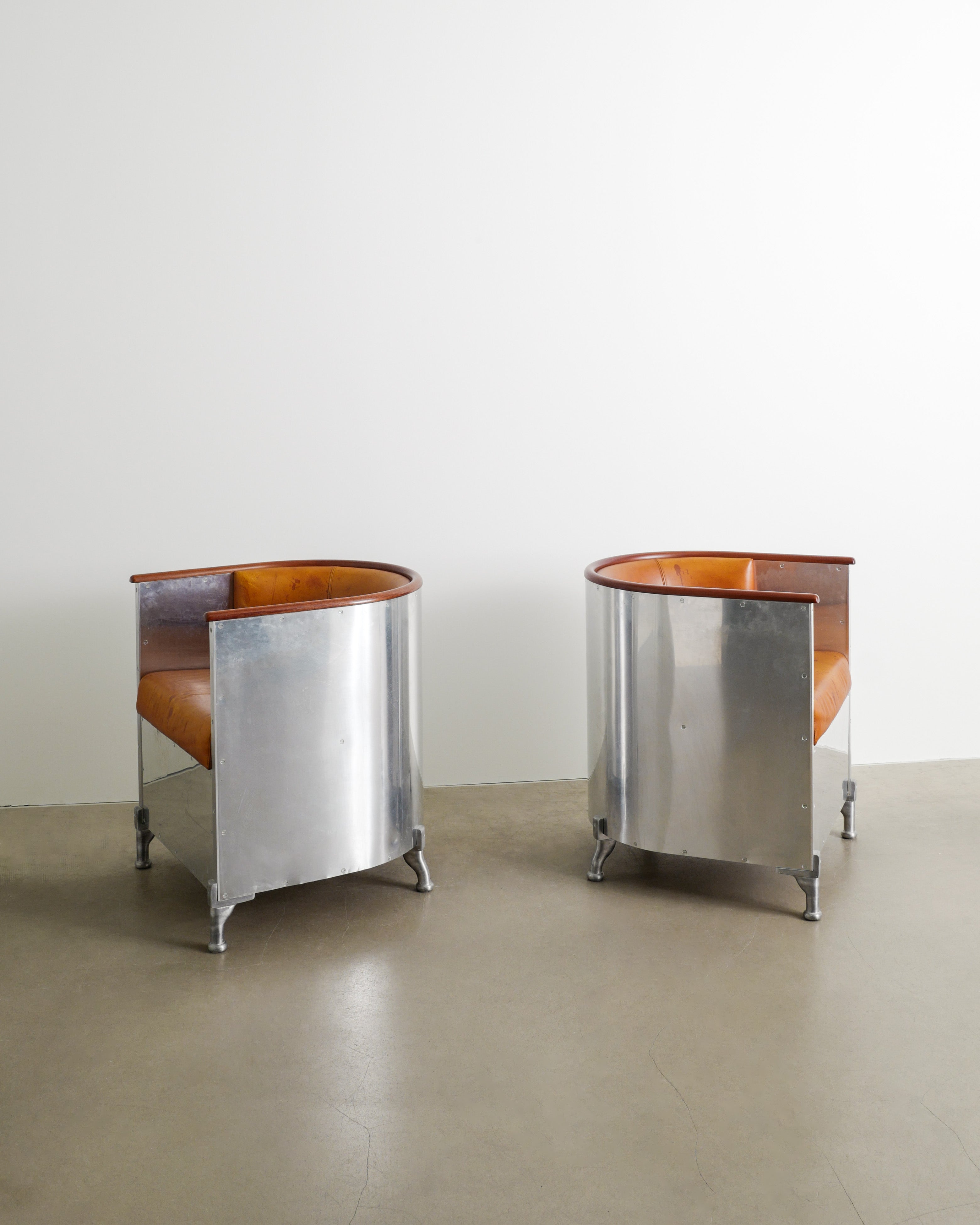 MATS THESELIUS ALUMINUM ARMCHAIRS