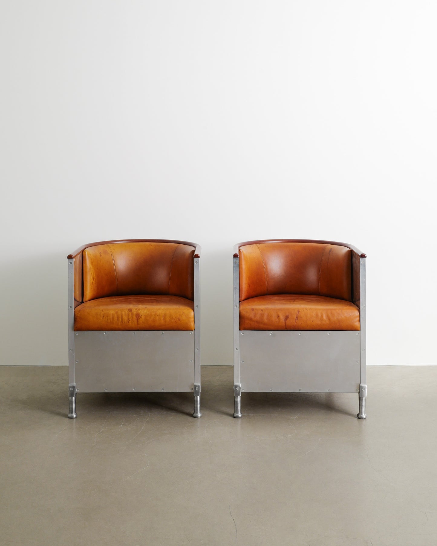 MATS THESELIUS ALUMINUM ARMCHAIRS