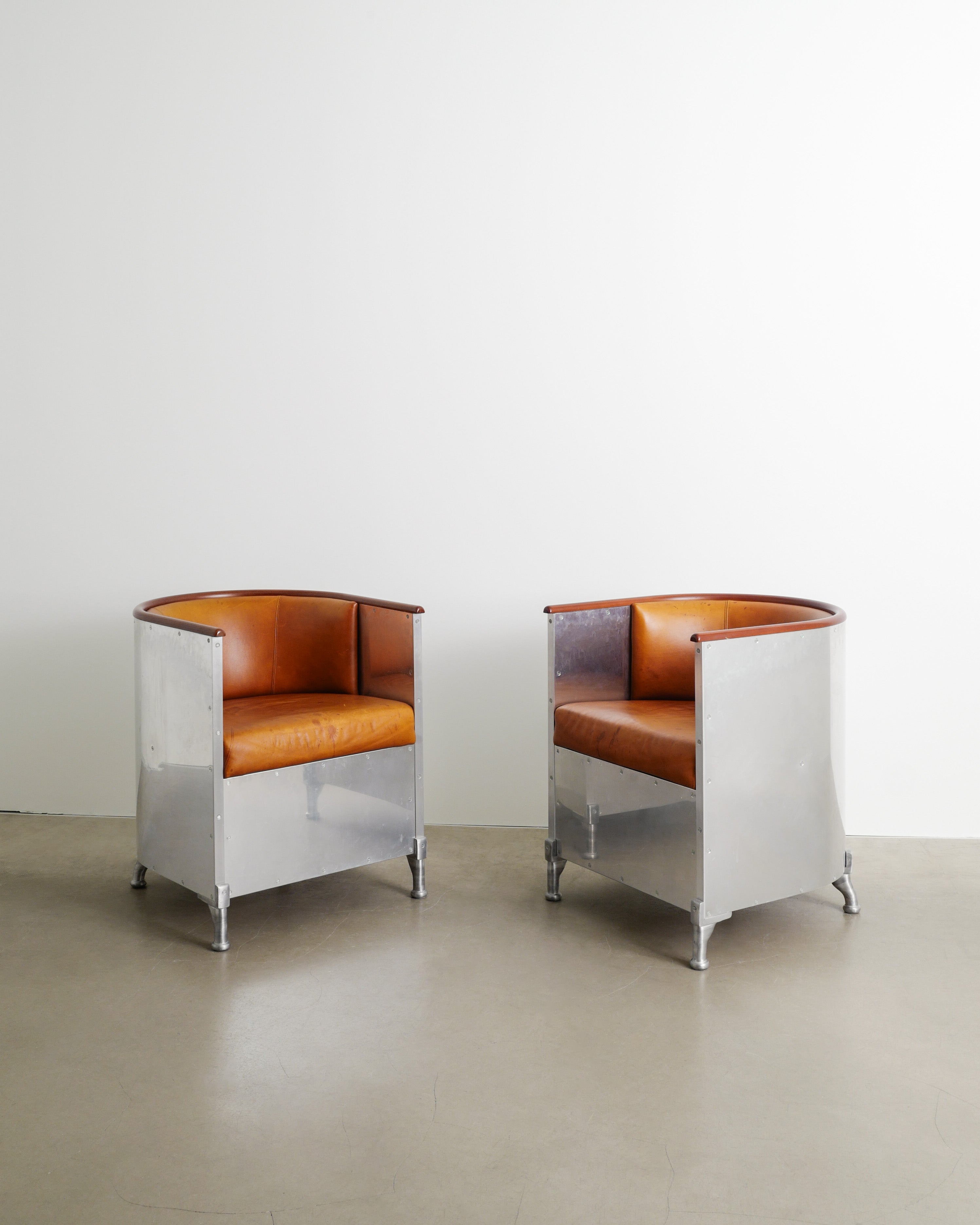 MATS THESELIUS ALUMINUM ARMCHAIRS