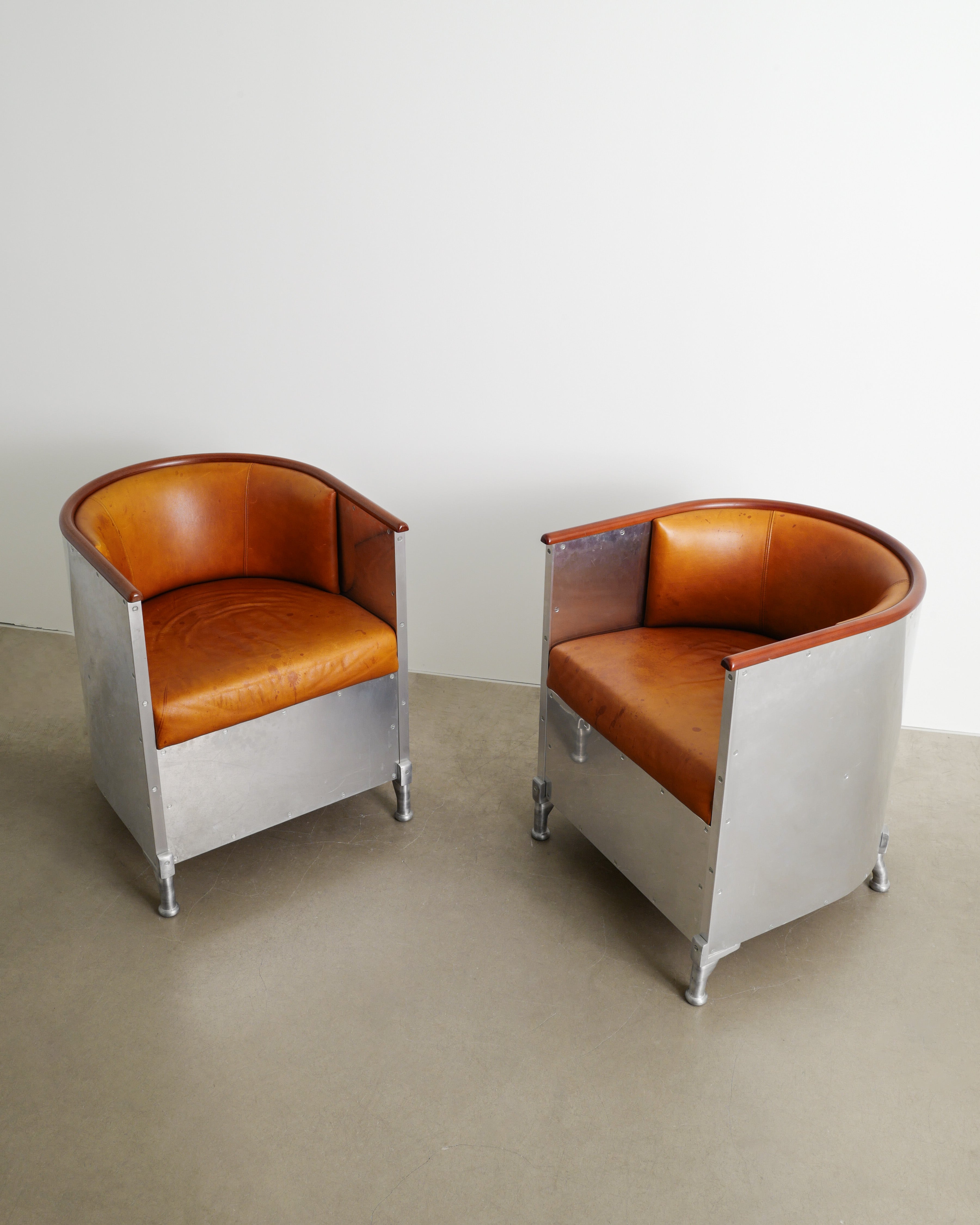 MATS THESELIUS ALUMINUM ARMCHAIRS