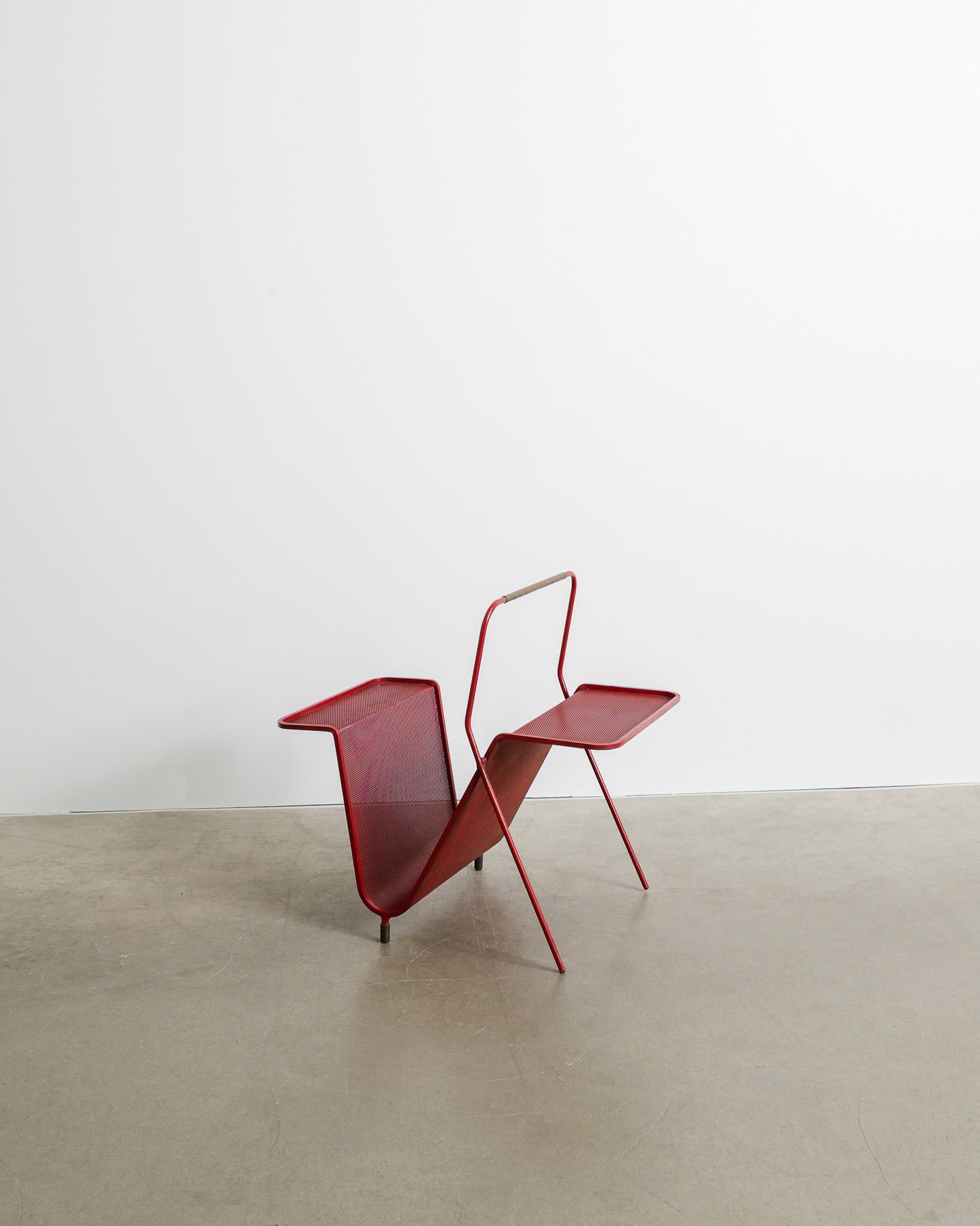 MATHIEU MATÉGOT MAGAZINE RACK, 1950s
