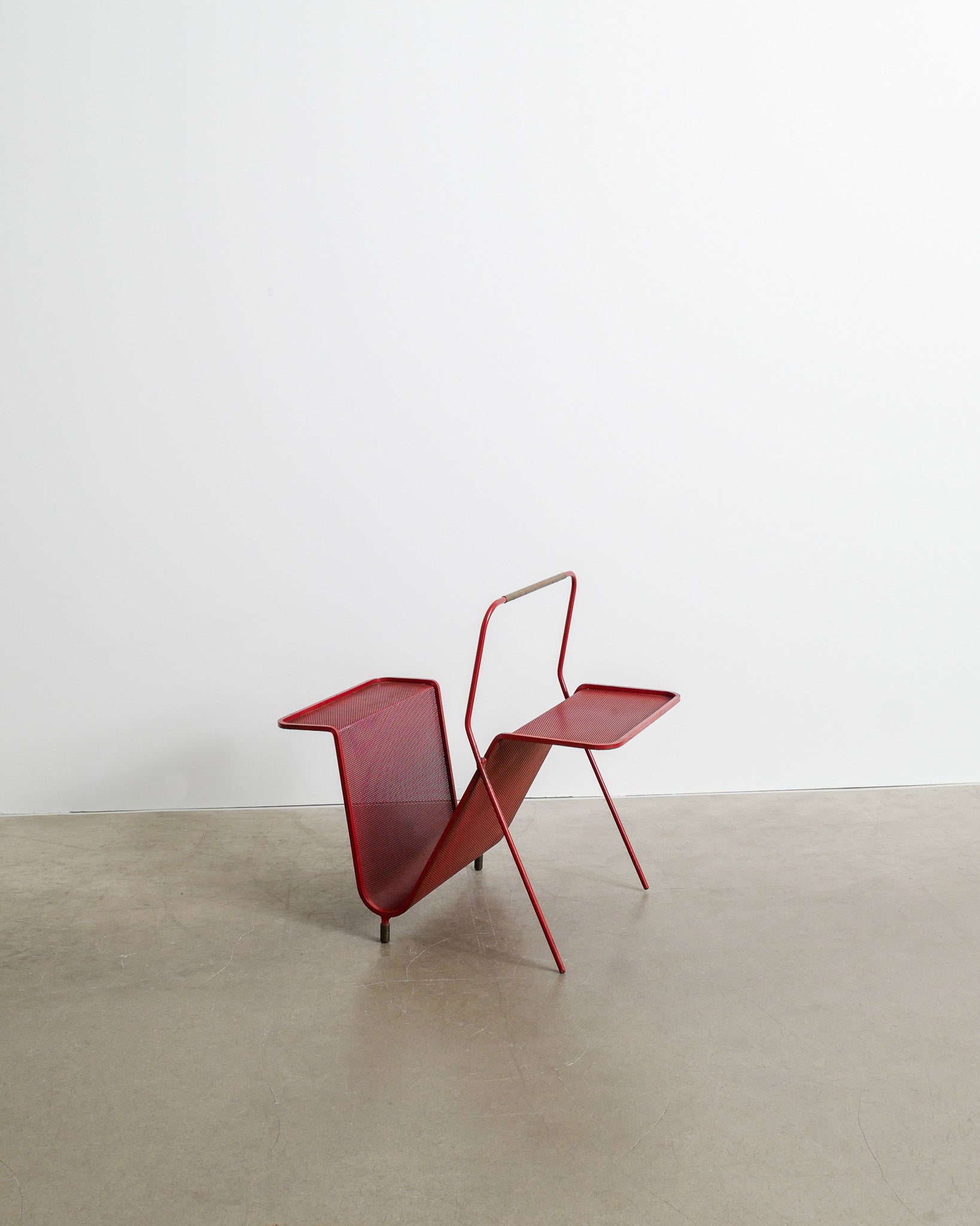 MATHIEU MATÉGOT MAGAZINE RACK, 1950s