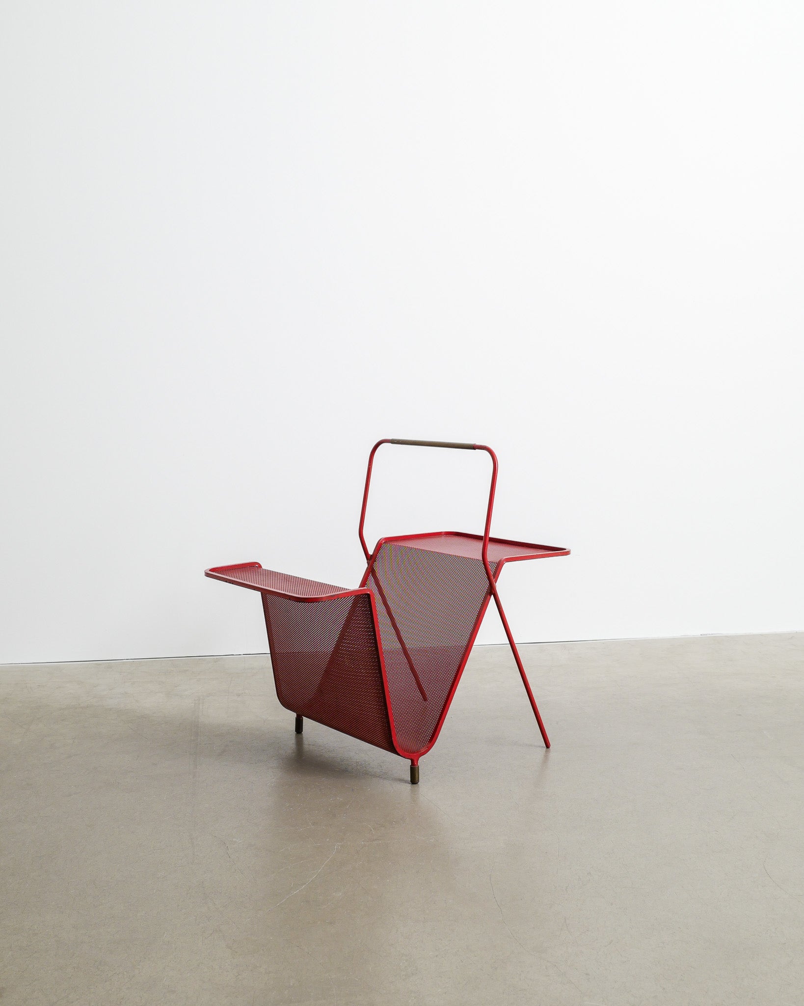 MATHIEU MATÉGOT MAGAZINE RACK, 1950s